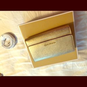 Michael Kors pale gold purse/clutch